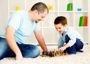 Happy family is enjoying in living room.